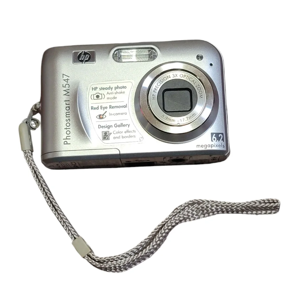 HP Photosmart M547 6.2MP Digital Camera with 3x Optical Zoom